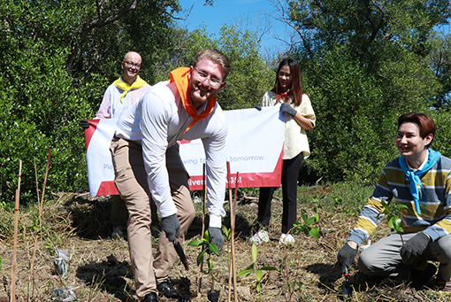 AGS Thailand employees planting mangrove saplings at Bangpu Nature Education Centre for their AMCHAM award-winning CSR initiative.